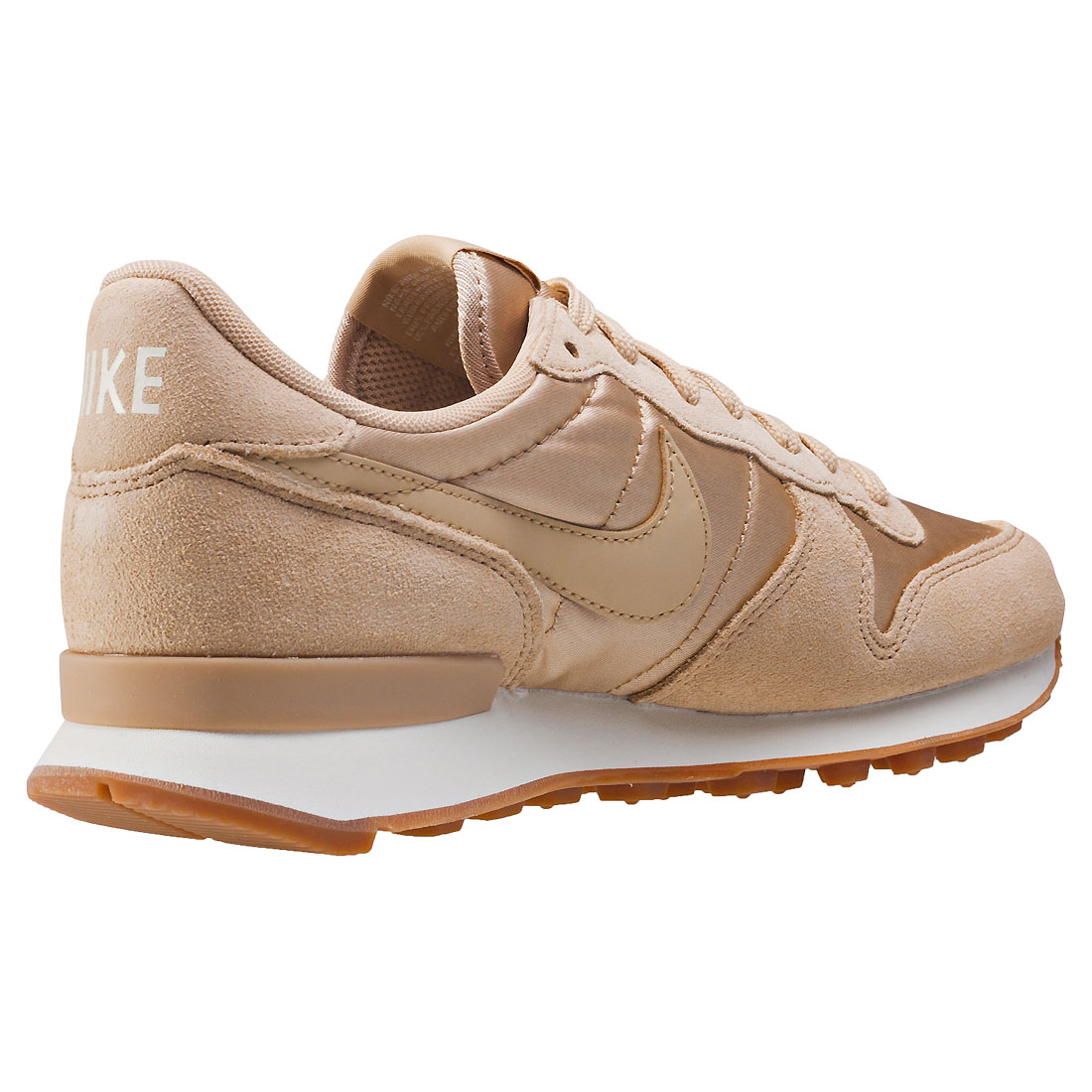 beige nike shoes